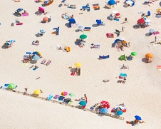 Wall art aerial photo of people on the beach in the summer 