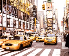 A wall art photo of yellow cabs on Time Square, New York City