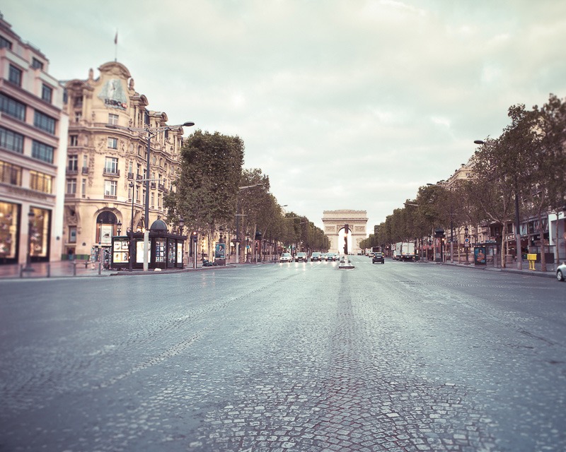 A wall art photo of the Champs Elysee early in the morning