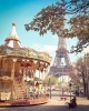 A dreamy wall art photo of a carousel and the Eiffel Tower in Paris