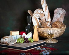 Still life wall art of bread, cheese, grapes and wine