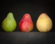 Still life wall art of green, red and yellow pears